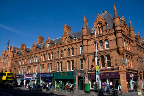 Beautiful building with shops on ground floor